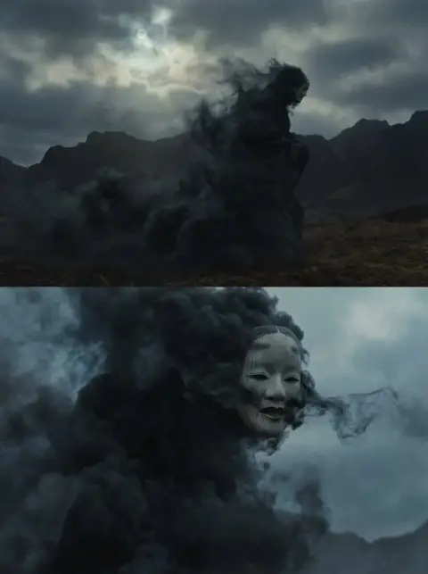 A giant energy-faced phantom emerging from the black mist