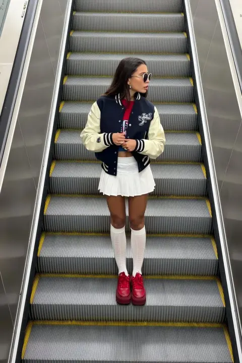 An overhead shot of sweet and spicy outfits on the escalator