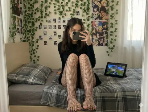 Black fishnet stockings, beautiful legs covering face, selfie and anime boudoir