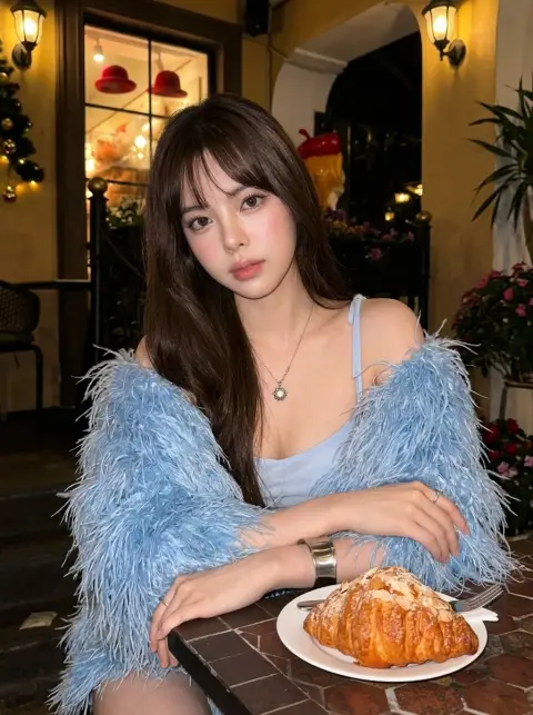 Blue feather girl in the warm light cafe
