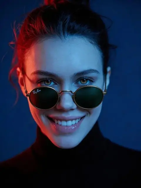 Cyberdark style female portrait in retro sunglasses
