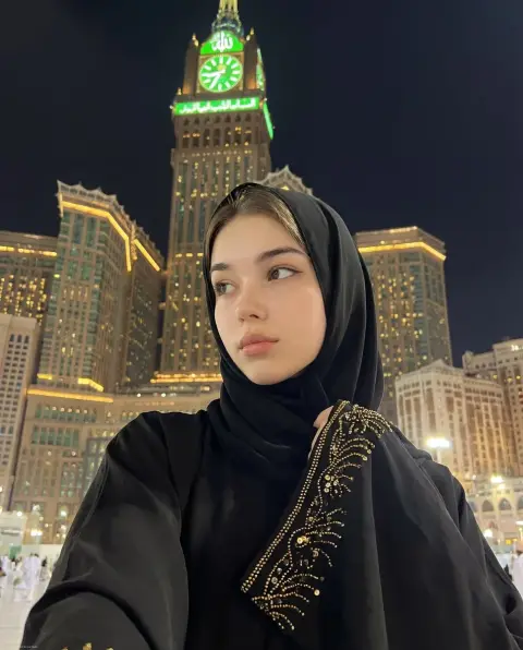 Elegant selfie at night at Mecca Clock Tower