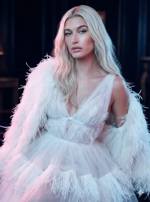 Feather haute couture fashion blockbuster under the luxurious light and shadow at night