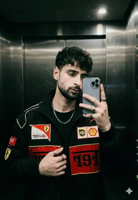 Ferrari racing boy taking selfie in elevator mirror