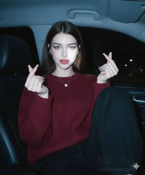 Girl in red under retro millennium style car flashlight