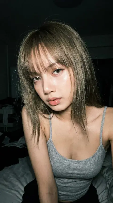 iPhone 17 Pro style late night bedroom direct flash portrait