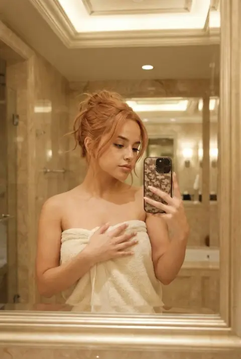 Lazy mirror selfie in luxury marble bathroom