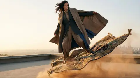 Luxurious fashion shoot at the moment the flying carpet takes off from the sun terrace