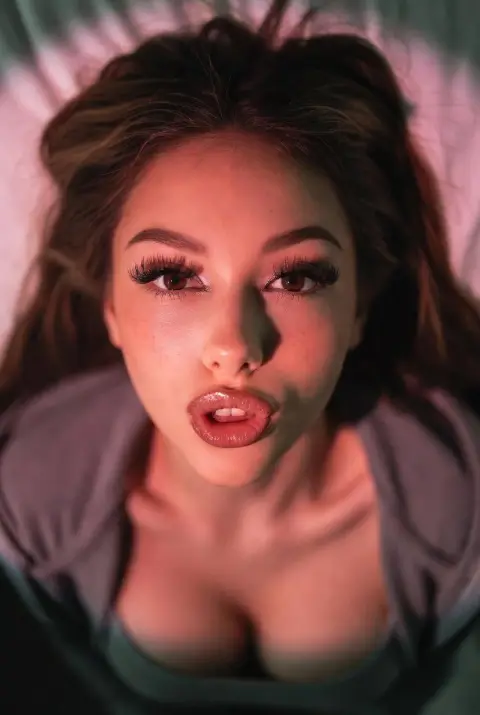 Millennial hottie's intimate atmosphere shot under high-angle flashlight