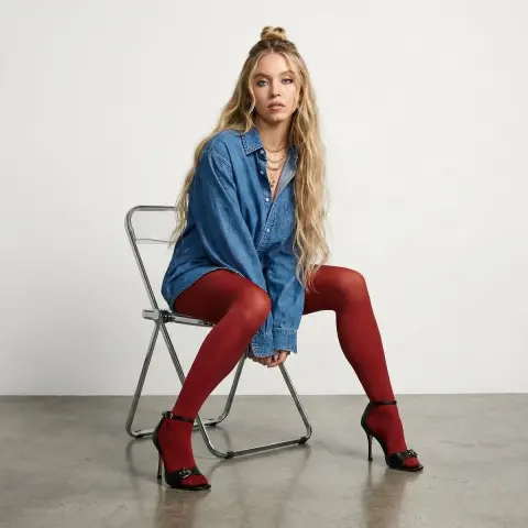 Minimalist studio shot of super long blond haired beauty
