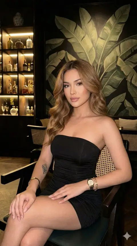 Modern girl in black dress in luxury lounge