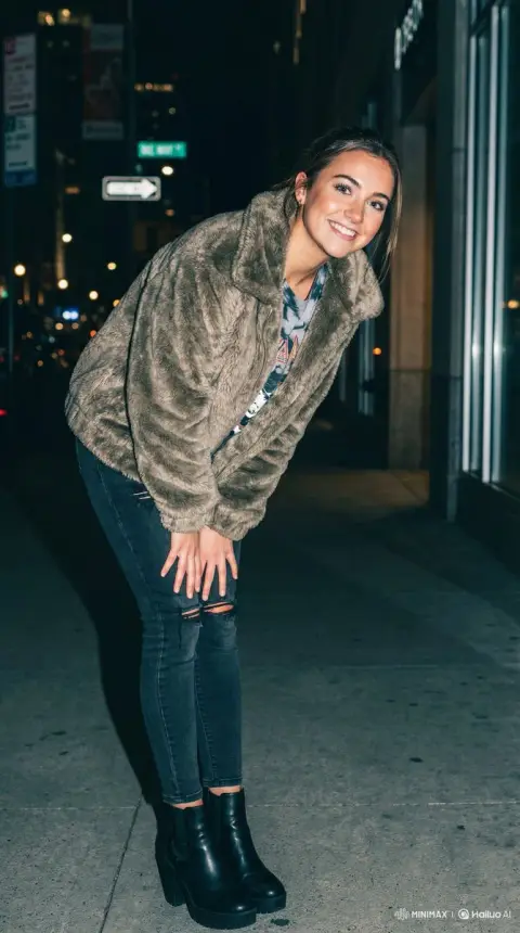 Night street photography of playful girl under flash light