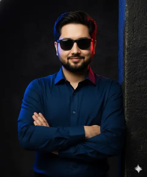 Portrait of confident young man under red and blue outline light