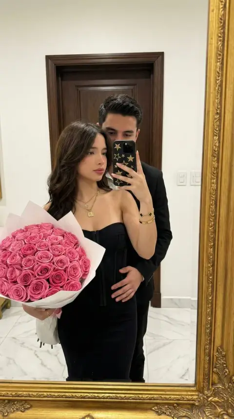 Selfie of couple at luxury dinner under gorgeous frames