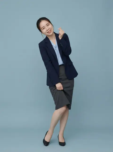 She playfully tilts her head to express her feelings, the ultimate cute girl