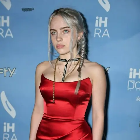 Silver-haired beauty in stunning satin haute couture