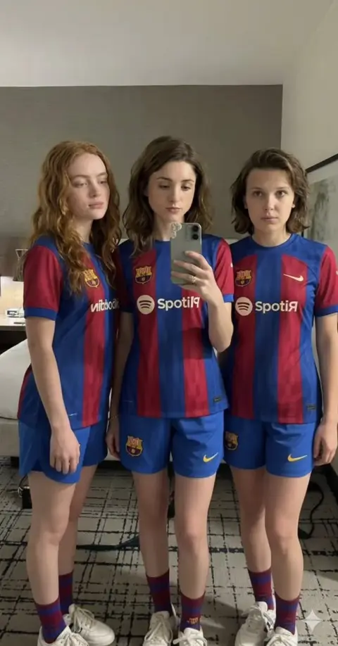 Stranger Things three beauties take selfies in hotel wearing Barcelona jerseys