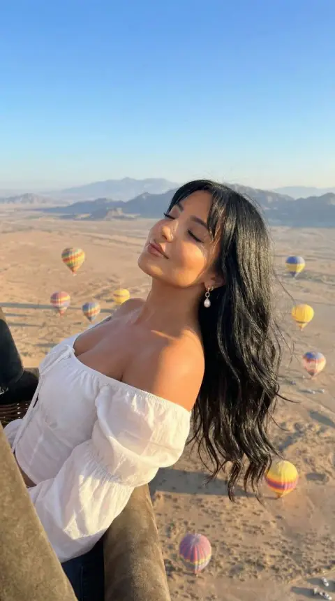 Sunshine girl on desert hot air balloon
