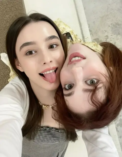 Super realistic close-up of best friends making funny faces