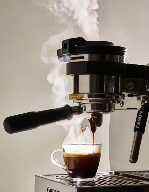 Super realistic espresso machine extraction commercial photography