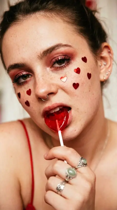 Sweet cool macro close-up under lollipop with red heart