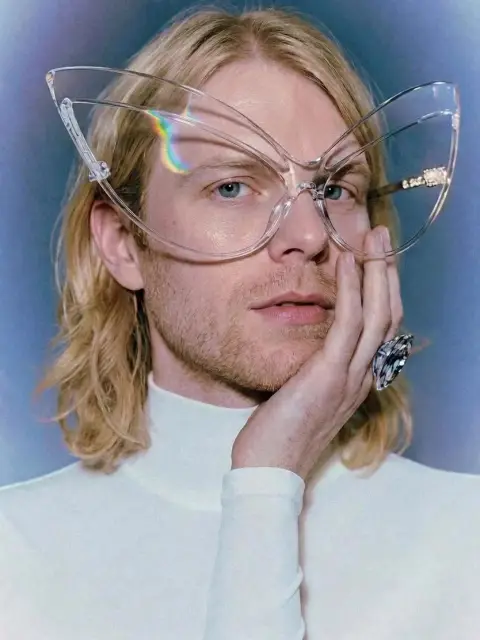that rainbow sweep through the lens in motion hits completely different 🌈✨ the hair drift + blue haze breathing — full editorial film moment.