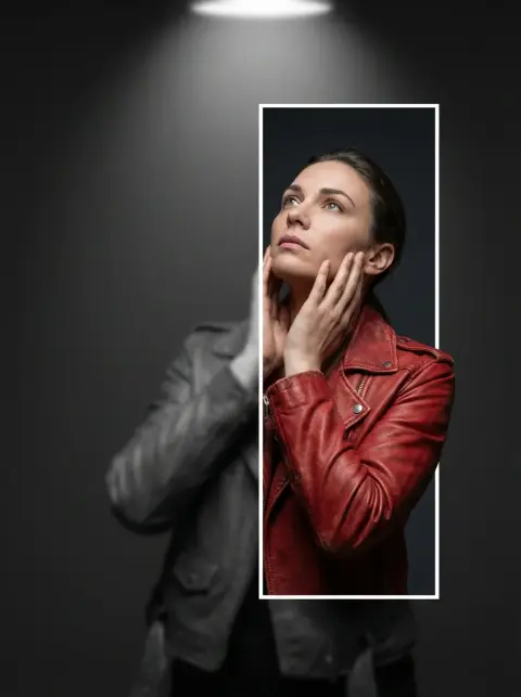 The girl in red breaks out of the frame and leaps out of the gray world